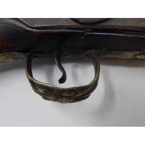 454 - 18th Century Turkish Flintlock Pistol with brass mounts & fittings: Condition: Poor: Measures 39cm L... 