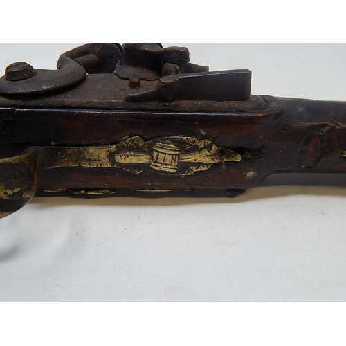 454 - 18th Century Turkish Flintlock Pistol with brass mounts & fittings: Condition: Poor: Measures 39cm L... 