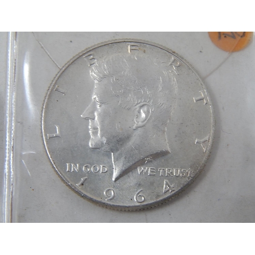 669 - COINS: Kennedy Half Dollars: 1962/2x 1964/2x 1965/1967 & One Dollar Calgary Stampede