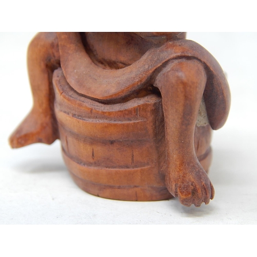 484 - CHINESE: Carved Wood Neksuke of a Monkey on a Barrel: Measures 5.2cm Wide