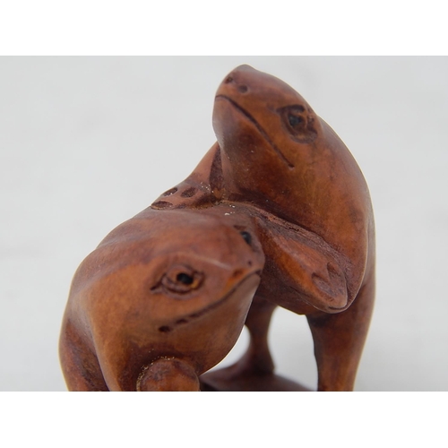 486 - CHINESE: Carved Wood Neksuke of Frogs: Measures 5.2cm High