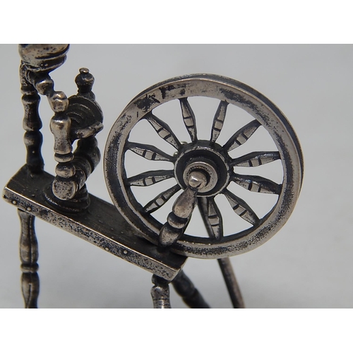 99H - Dutch Silver Model of a Spinning Wheel with articulated wheel: Measures 6cm high