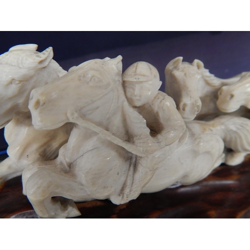 488 - Meiji Period (1868-1912) Japanese Ivory Tusk Carved as a Team of Running Horses, a Rider Upon One on... 