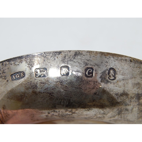 28 - ANTHONY ELSON: Silver Tastevin with naturalistic handle formed as branches complimenting a plain cir... 