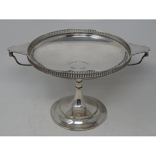 31 - Arts & Crafts Silver Tazza with pierced gallery & stylised twin handles sitting on a conical foot. H... 
