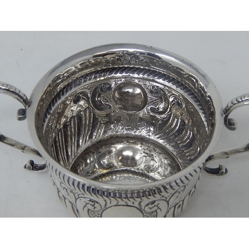 45 - Edwardian Silver Porringer: Hallmarked Chester 1903 by Nathan & Hayes: 17.5cm across Handles: Weight... 