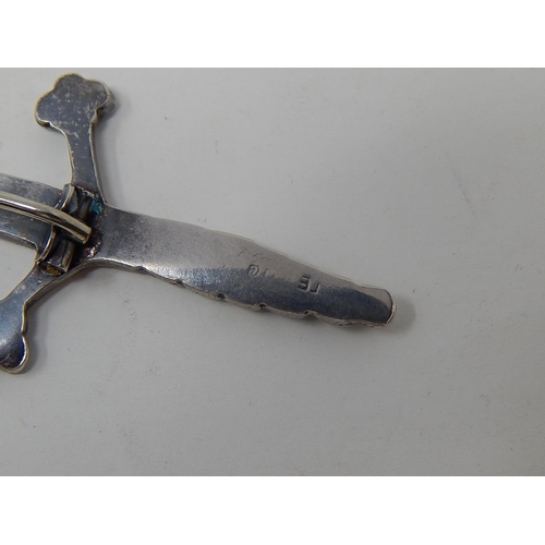 6 - Silver Kilt Pin Formed as a Scottish Sword. Bears strike marks & Initials:  Length 9cm