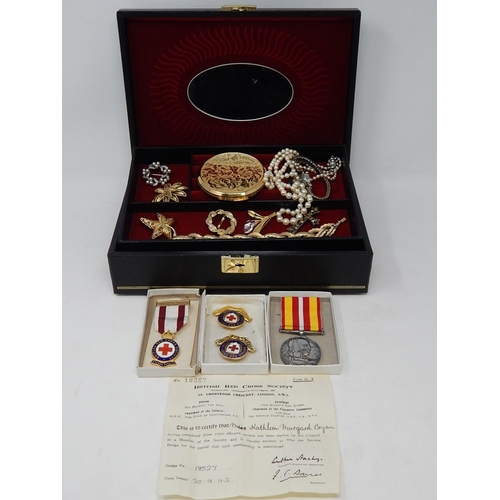 77 - A Collection of Costume Jewellery together with Red Cross Medals in a Fitted Jewellery Box with key.