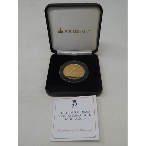 73 - Tristan da Cunha £2 piece struck in 22ct gold and weighing 16g issued to commemorate the passing of ... 