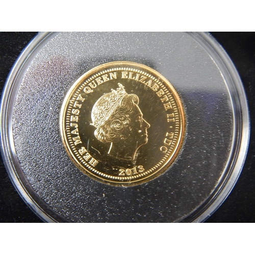 77 - Tristan da Cunha 2014 60th Anniversary coin struck in 9ct Gold weight 2.75g