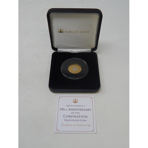 77 - Tristan da Cunha 2014 60th Anniversary coin struck in 9ct Gold weight 2.75g