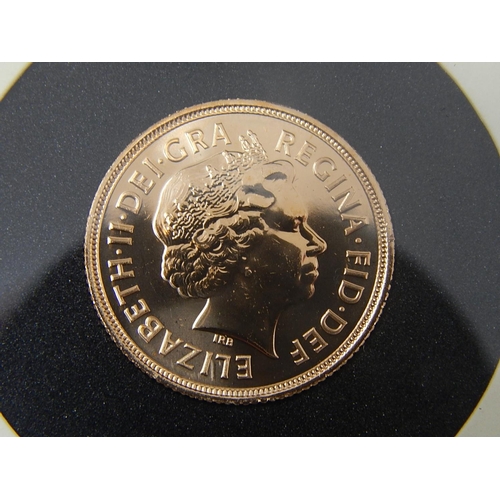 86 - 2012 Gold Sovereign about Brilliant Uncirculated in Tower Hill capsule