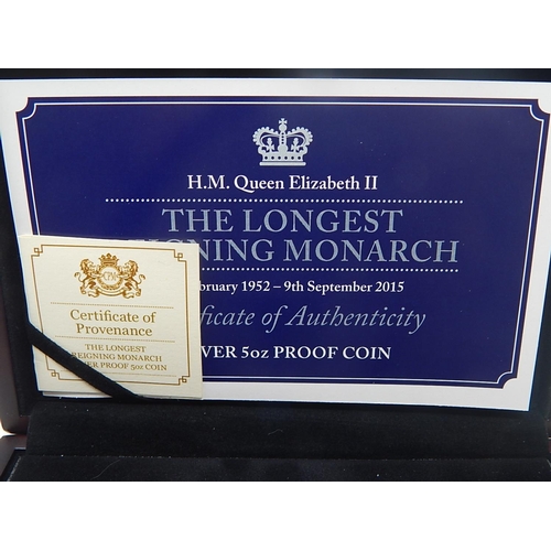 106 - 5 ounce Silver Longest Reigning Monarch Round practically as struck in original box with COA