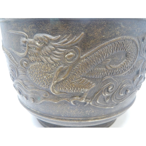 101 - Chinese Bronze Swing Handled Pot with Raised Dragon Decoration: Measures 18.5cm Diameter