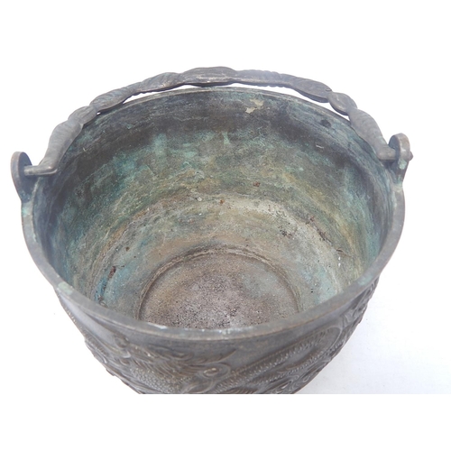 101 - Chinese Bronze Swing Handled Pot with Raised Dragon Decoration: Measures 18.5cm Diameter