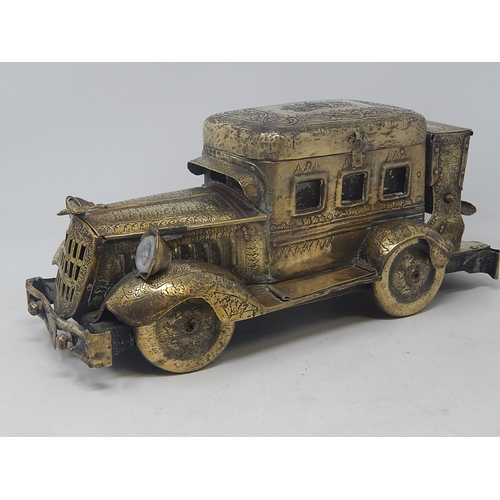 105 - Rare 1920's Indian Brass Desk Set & Cigarette Dispenser Formed as a Car: The Intricately Engraved Bo... 