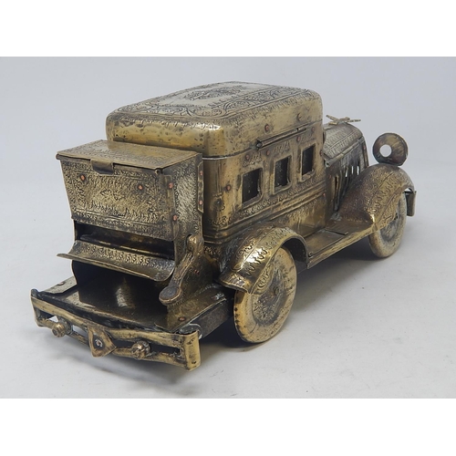 105 - Rare 1920's Indian Brass Desk Set & Cigarette Dispenser Formed as a Car: The Intricately Engraved Bo... 