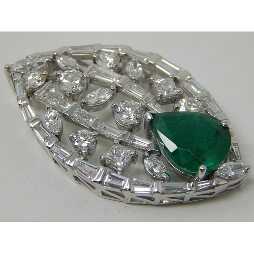 80 - Emerald and diamond pendant, marquise shaped openwork pendant set with a pear cut emerald at the bot... 