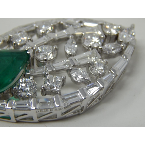 80 - Emerald and diamond pendant, marquise shaped openwork pendant set with a pear cut emerald at the bot... 