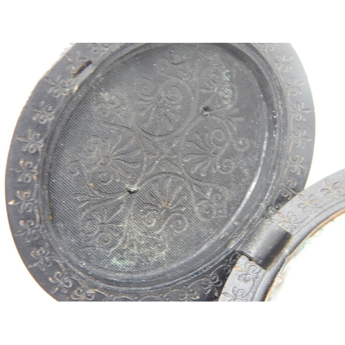 87 - Victorian Jet Mourning Locket c.1870 Set with Central Raised panel carved with flowers & scroll bann... 