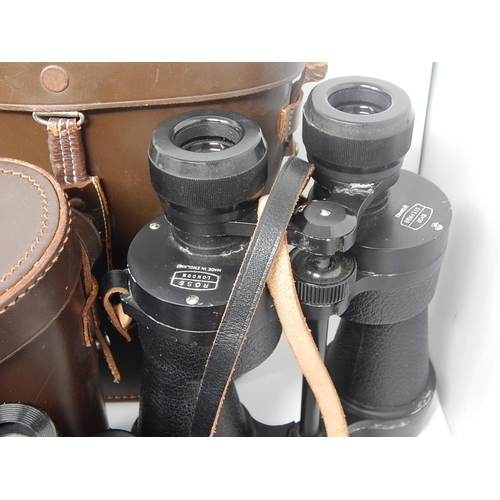 108 - Three Pairs of Binoculars: Two Pairs by ROSS of London in Leather Cases & one by Pentax.