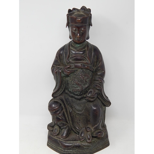 127 - Chinese bronze study of a seated emperor, character marks to the reverse, 38.5cm high