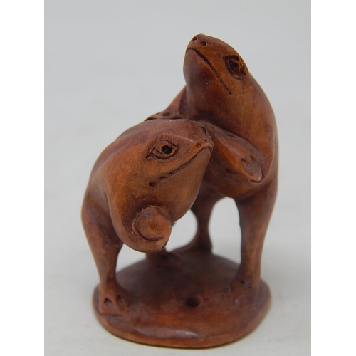 136 - CHINESE: Carved Wood Neksuke of Frogs: Measures 5.2cm High