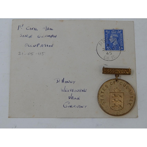 143 - Guernsey Liberation from German Occupation Medal 1945 together with the 1st civil mail since German ... 