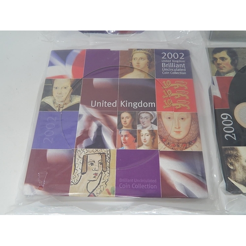 213 - 2002 £2 x 2; Brilliant Uncirculated Sets 2001, 2002, 2006 2009