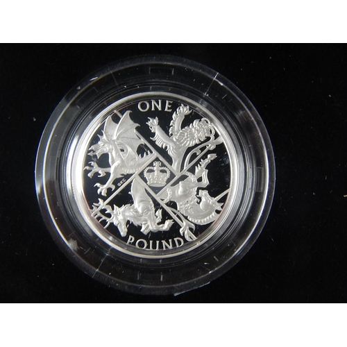 275 - The last round Pound Silver Proof coin practically as struck in original cases of issue with COA