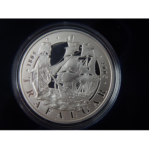 295 - 2005 Nelson Silver Proof 2 Crown Set; 2014 Outbreak £2 Silver coin practically as struck in original... 