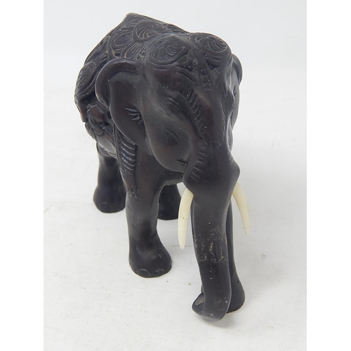 552 - 1920's Hardwood Elephant: Length 14cm: Height 13cm