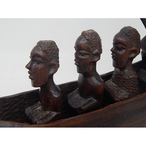 558 - Tribal Art: Carved Wooden Boat with Removeable Figures: 32 cm Long