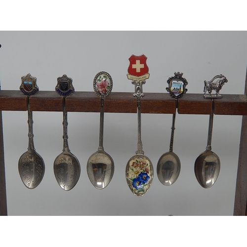 564 - Collection of Silver Plated & White Metal Souvenir Spoons with Wooden Rack.