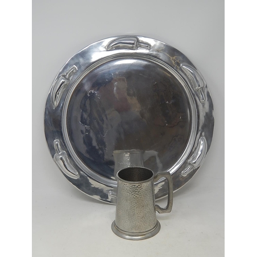 567 - Large Pewter Charger 40cm diameter together with a MANOR Pewter Pint Tankard.