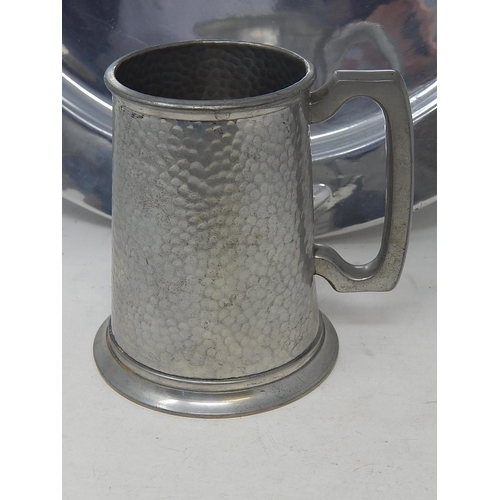 567 - Large Pewter Charger 40cm diameter together with a MANOR Pewter Pint Tankard.