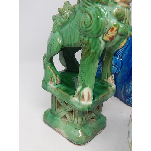 583 - Four Oriental Tomb Dogs together with a Chinese Ginger Jar on Wooden Stand. The Tallest 26cm