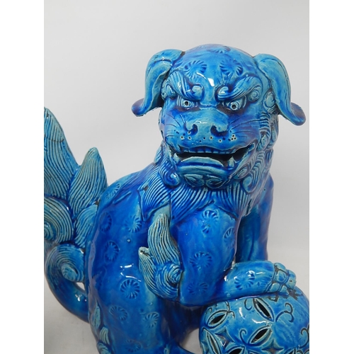 583 - Four Oriental Tomb Dogs together with a Chinese Ginger Jar on Wooden Stand. The Tallest 26cm