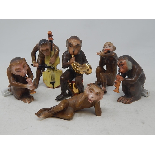 584 - Monkey Band: Comprising Monkeys Playing Instruments & a Further Monkey with His Hands Over His Ears.