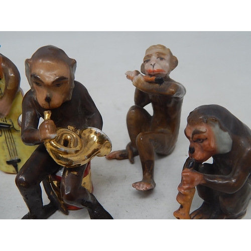 584 - Monkey Band: Comprising Monkeys Playing Instruments & a Further Monkey with His Hands Over His Ears.