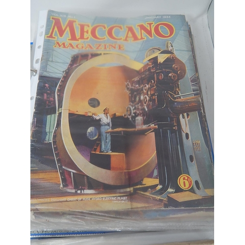 528C - MECCANO: Four Folders Containing a Large Number of Meccano Magazines From: 1930/1931/1934/1935