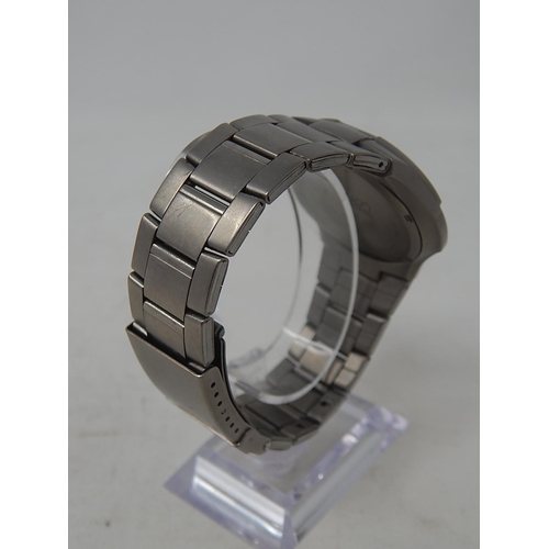 24 - Lorus: Gentleman's Sports Titanium 100m Water resistant Date Wristwatch. Working Well Presently.