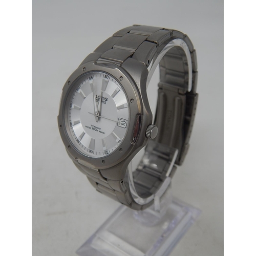 33 - Lorus: Gentleman's Sports Titanium 100m Water resistant Date Wristwatch. Working Well Presently.