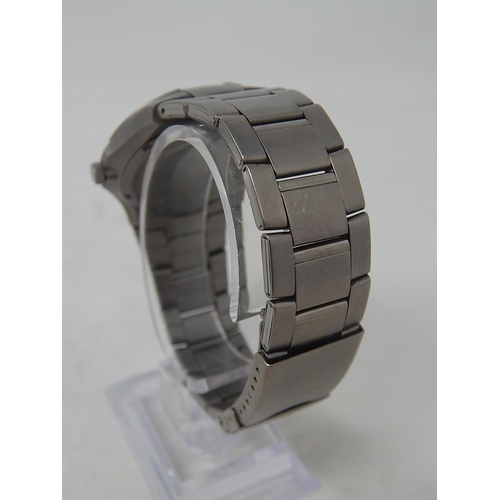33 - Lorus: Gentleman's Sports Titanium 100m Water resistant Date Wristwatch. Working Well Presently.