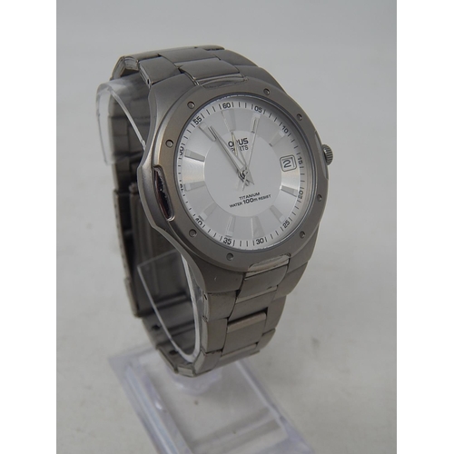 33 - Lorus: Gentleman's Sports Titanium 100m Water resistant Date Wristwatch. Working Well Presently.