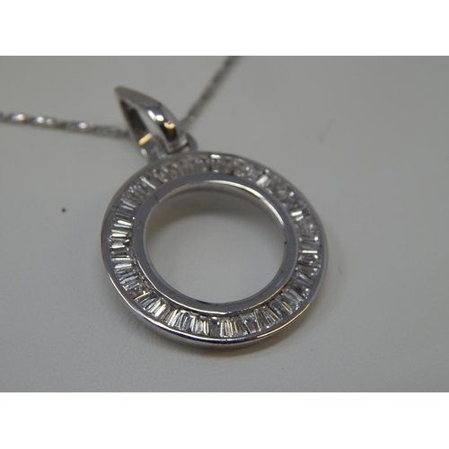 36 - 18ct White Gold Pendant set with tapering baguette cut diamonds, channel set totalling 1.0ct on an 1... 