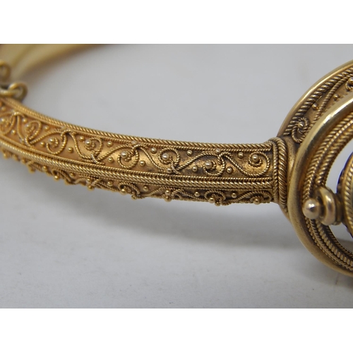 37 - 18ct Yellow Gold Victorian bangle featuring swivel maroon Intaglio seal with scarab beetle decoratio... 