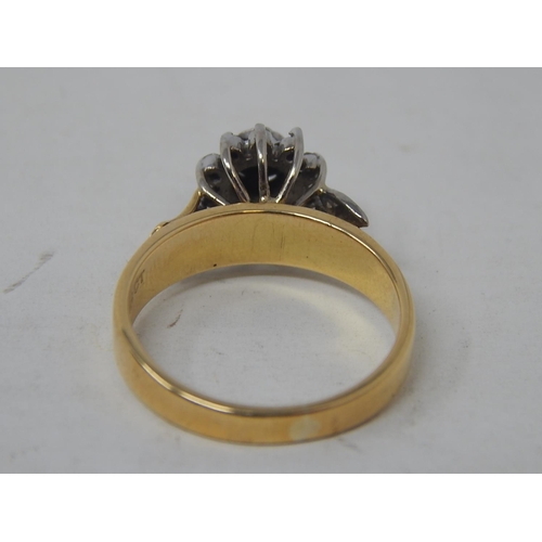 38 - 18ct Yellow & White gold diamond ring with 11 round cut brilliant cut diamonds claw set in cluster