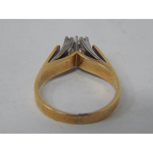 39 - 18ct Yellow & White gold Diamond ring with 5 round brilliant cut diamonds claw set.