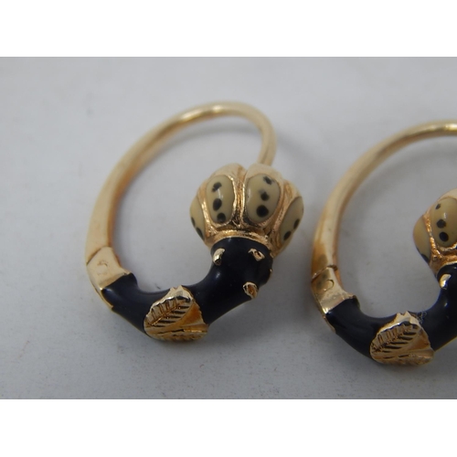 46 - 18ct Yellow Gold Vintage earrings with African woman theme.